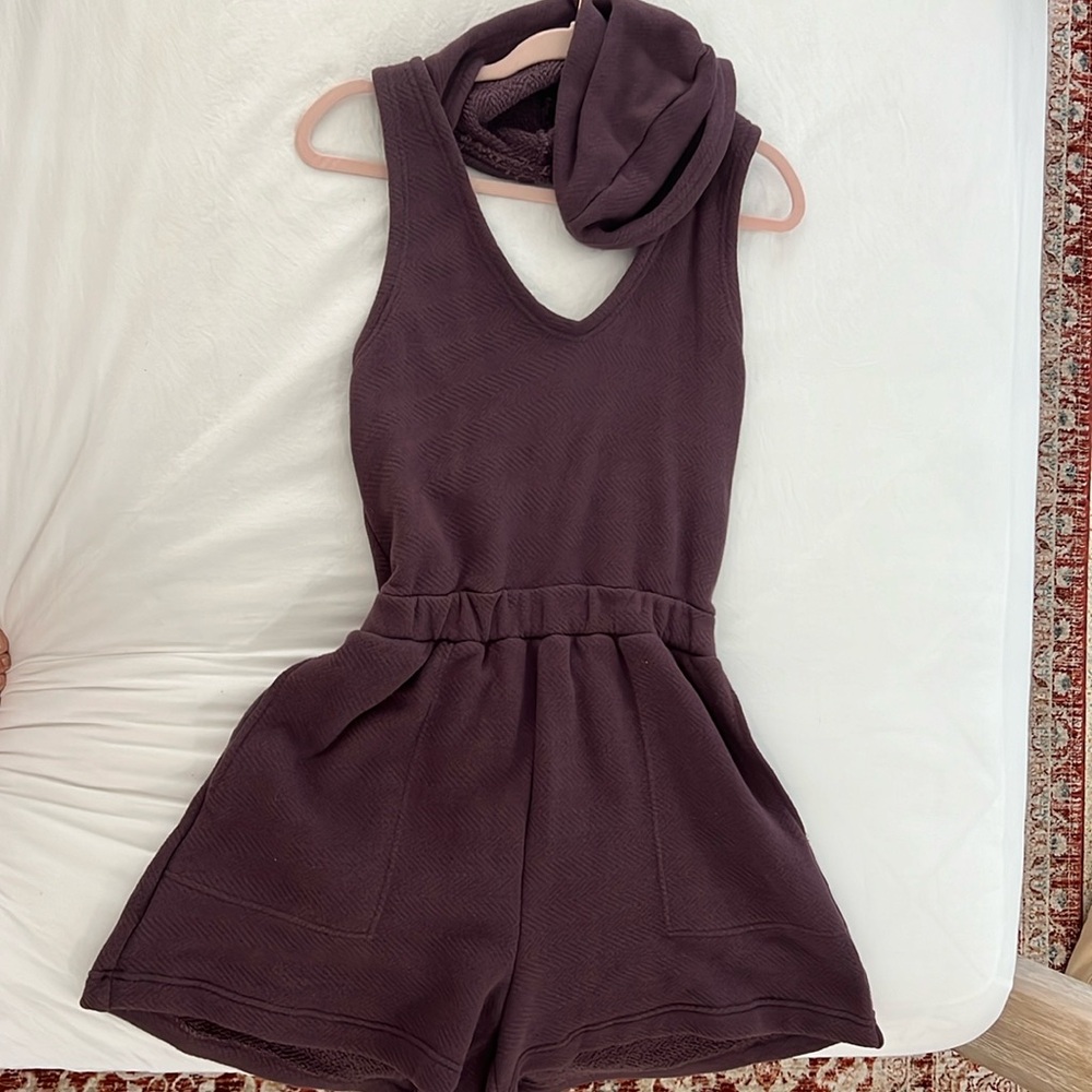 Free People Beach,dark plum romper,with pockets,and large hood.size small